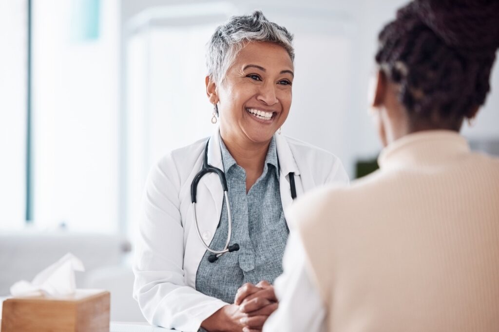 Doctor explaining allergy test results to patient in clinic